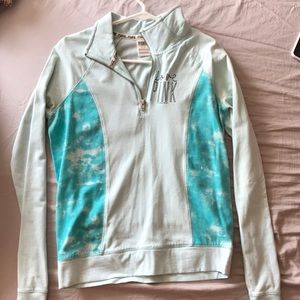 Pink quarter-zip sweater